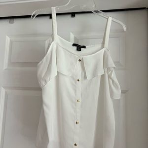 Cream sleeve less blouse